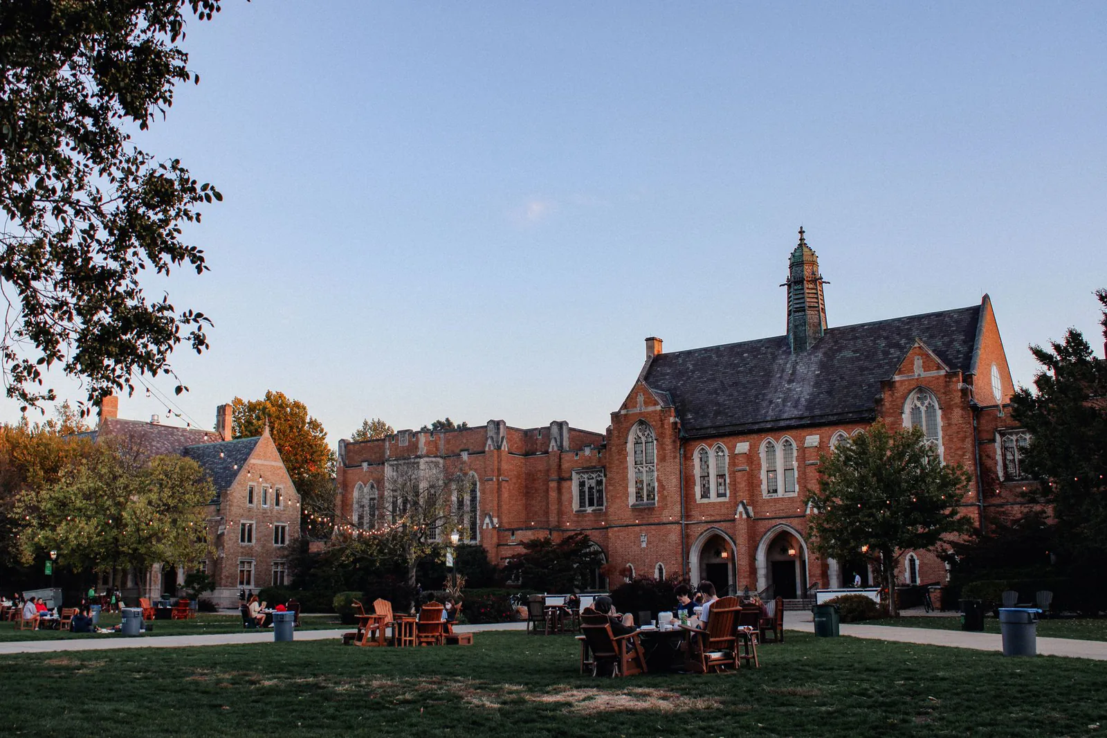 Students browsing organization booths at a campus involvement fair