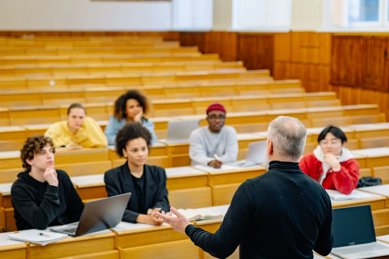 Students engaged in a university classroom discussion